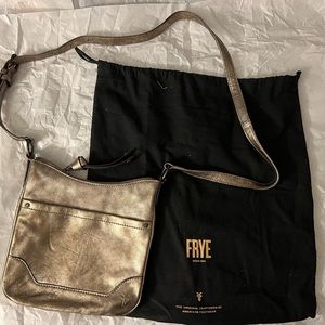 Metallic Frye cross body bag. Brand new.